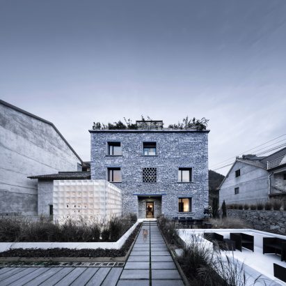 3D-printed pavilion contrasts with traditional stone structure at LEI House by AZL Architects