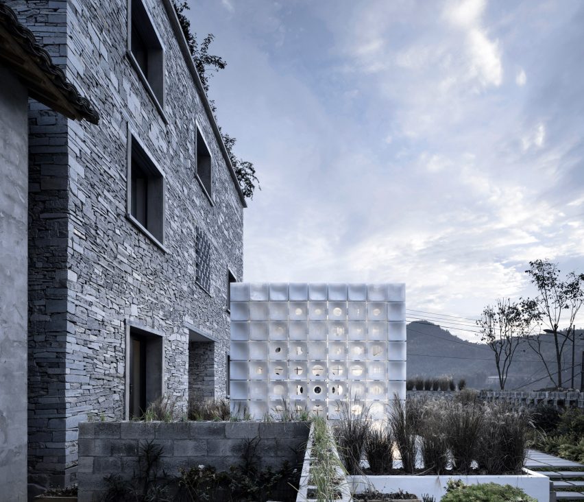 3D-printed pavilion contrasts with traditional stone structure at LEI House by AZL Architects