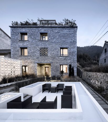 3D-printed pavilion contrasts with traditional stone structure at LEI House by AZL Architects