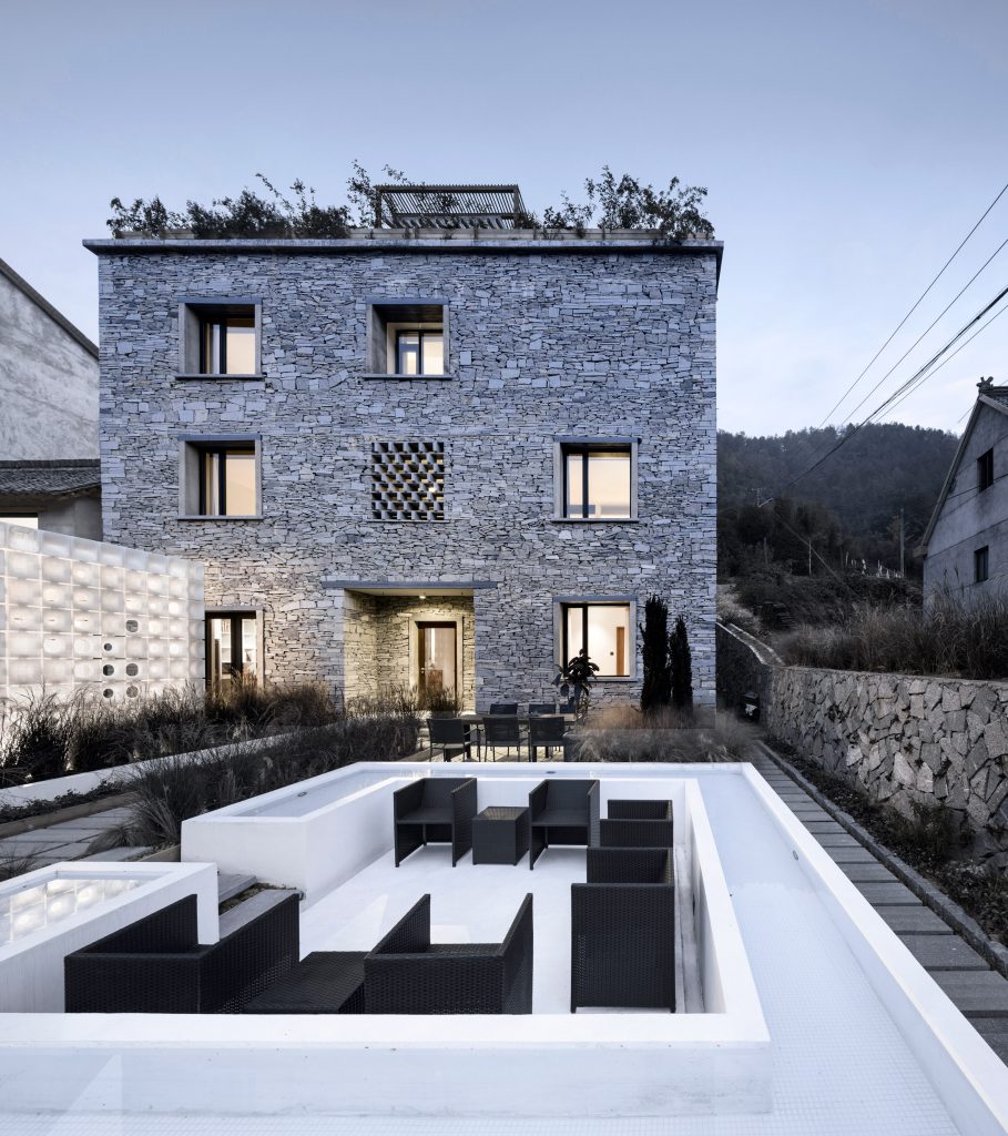 3D-printed pavilion contrasts with traditional stone structure at LEI House by AZL Architects