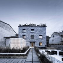 AZL Architects creates 3D-printed pavilion alongside stone house in Chinese village