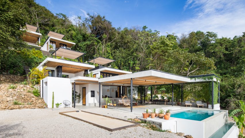 Staggered pavilions form holiday resort on lush hill in Costa Rican surf town