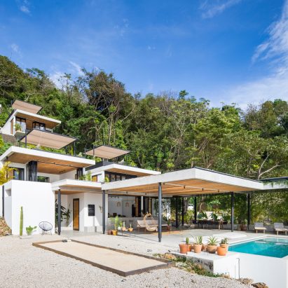 Staggered pavilions form holiday resort on lush hill in Costa Rican surf town
