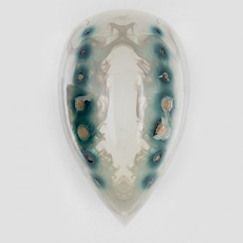 Neri Oxman creates masks inhabited by pigment-producing microorganisms