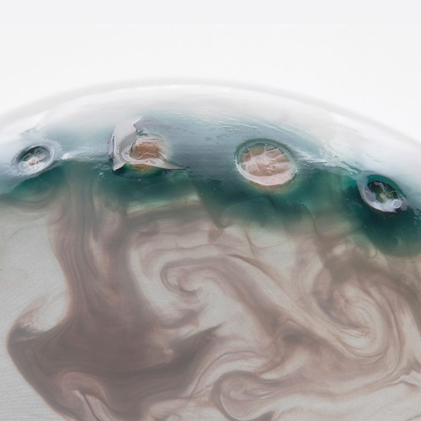 Neri Oxman creates masks inhabited by pigment-producing microorganisms