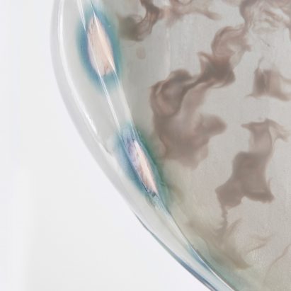 Neri Oxman creates masks inhabited by pigment-producing microorganisms