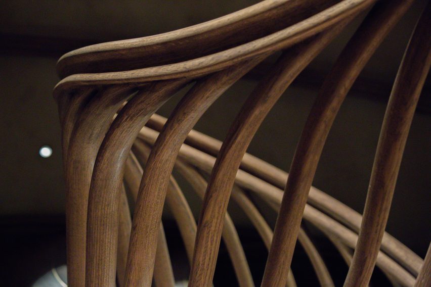 Atmos Studio's spiralling timber staircase features "leaf-like" stairs that emerge from a structural stem