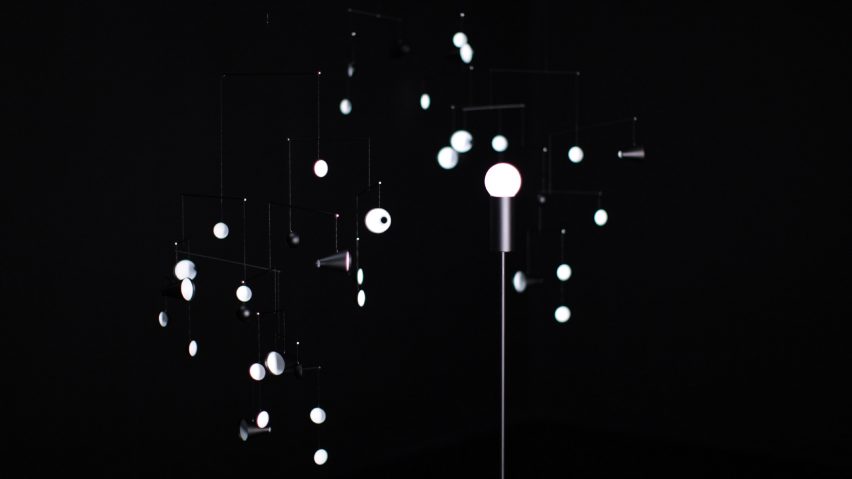 Hiroto Yoshizoe’s mirrored mobile 1.625m/s2 reflects light from a single bulb