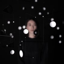 Hiroto Yoshizoe’s mirrored mobile 1.625m/s2 reflects light from a single bulb