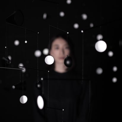 Hiroto Yoshizoe’s mirrored mobile 1.625m/s2 reflects light from a single bulb