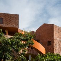 Chuon Chuon Kim Kindergarten by Kientruc O looks like a cluster of brick houses