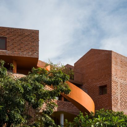 Chuon Chuon Kim Kindergarten by Kientruc O looks like a cluster of brick houses