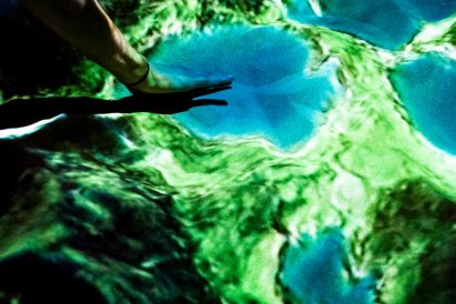 Tellart designs topographic sandpit table that lets you move mountains