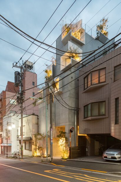 Akihisa Hirata stacks concrete boxes to create "futuristic and savage" Tree-ness House