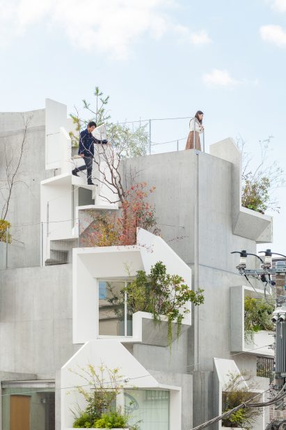 Akihisa Hirata stacks concrete boxes to create "futuristic and savage" Tree-ness House