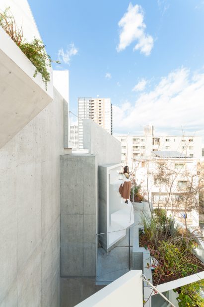 Akihisa Hirata stacks concrete boxes to create "futuristic and savage" Tree-ness House