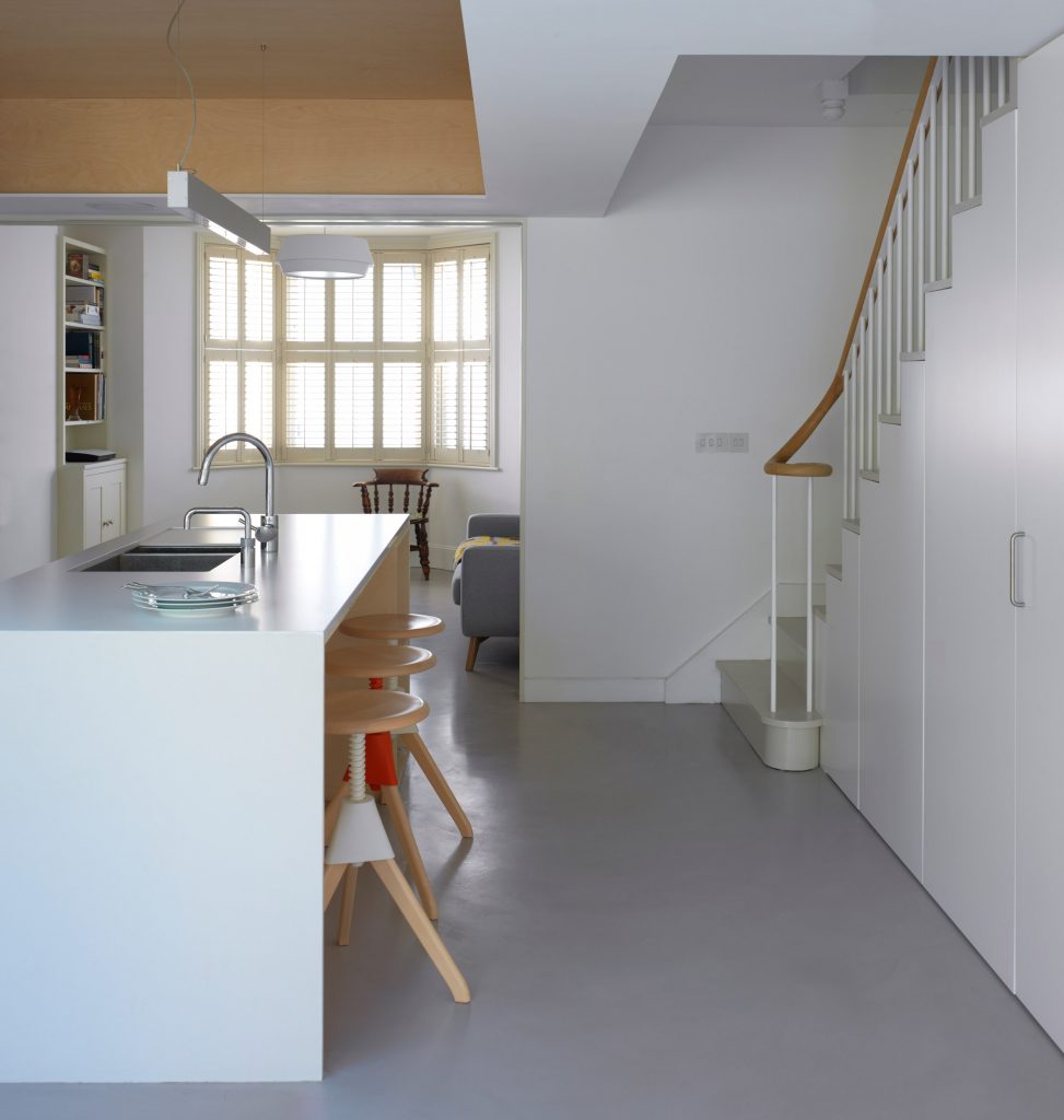 Glazed extension seamlessly connects refurbished Highbury house with new patio garden