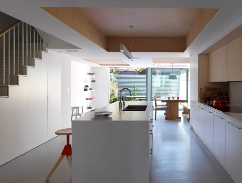 Glazed extension seamlessly connects refurbished Highbury house with new patio garden