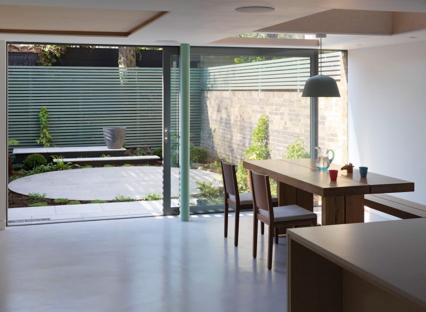 Glazed extension seamlessly connects refurbished Highbury house with new patio garden