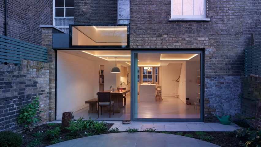 Glazed extension seamlessly connects refurbished Highbury house with new patio garden