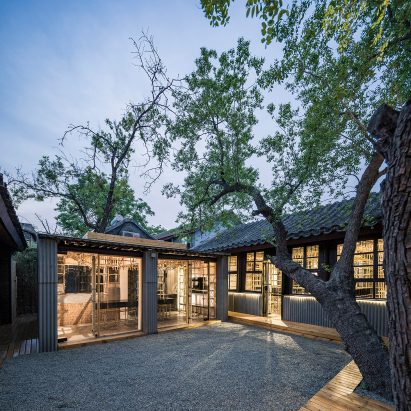 Gridded bamboo framework partitions Beijing office by 0 Architecture