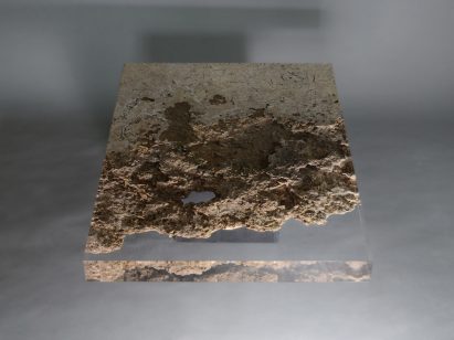 Alcarol and Vaselli create table and stools from travertine encased in resin