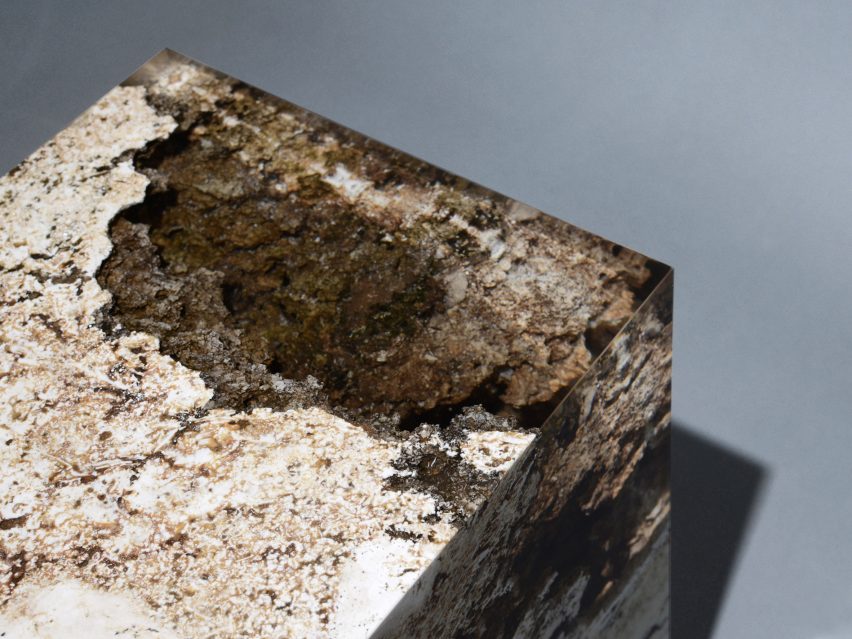 Alcarol and Vaselli create table and stools from travertine encased in resin