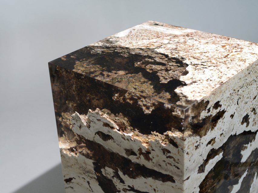 Alcarol and Vaselli create table and stools from travertine encased in resin