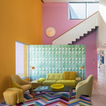 Eight home interiors furnished around statement rugs