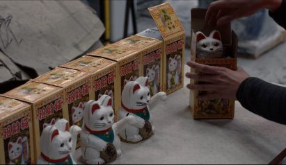 Katie May Boyd's installation turns plastic waste into beckoning cats