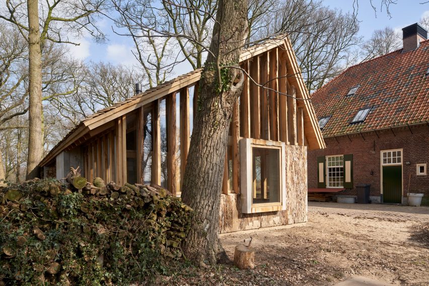 HilberinkBosch Architects builds timber and glass barn using wood felled from their own land