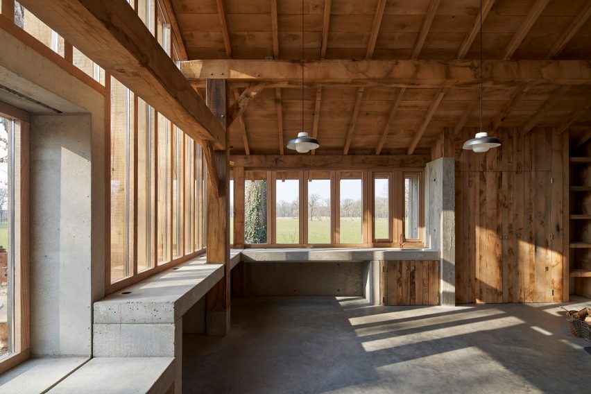 HilberinkBosch Architects builds timber and glass barn using wood felled from their own land