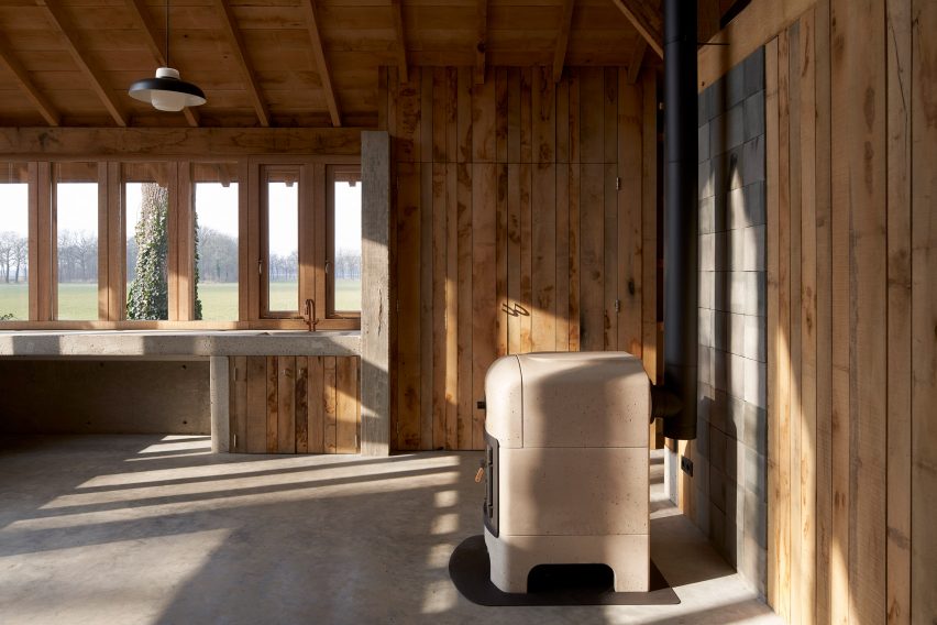 HilberinkBosch Architects builds timber and glass barn using wood felled from their own land