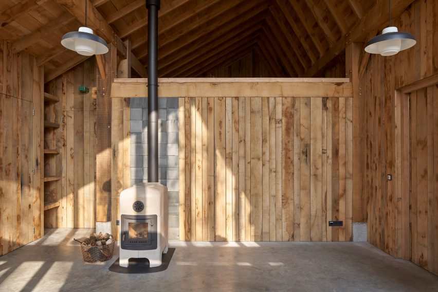 HilberinkBosch Architects builds timber and glass barn using wood felled from their own land