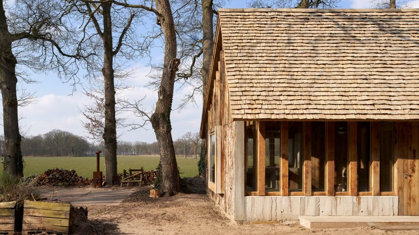 HilberinkBosch Architects builds timber and glass barn using wood felled from their own land