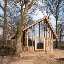 HilberinkBosch Architects builds timber and glass barn using wood felled from their own land