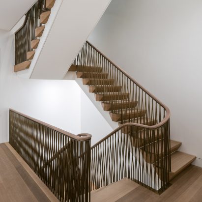 MKCA overhauls Upper East Side townhouse with custom staircase and furniture