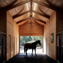 Elongated skylight illuminates stables in Chile by Matias Zegers Architects