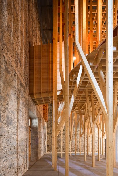 Portuguese architects Cerejeira Fontes renovate the Imaculada Chapel with an “indoor forest” structure