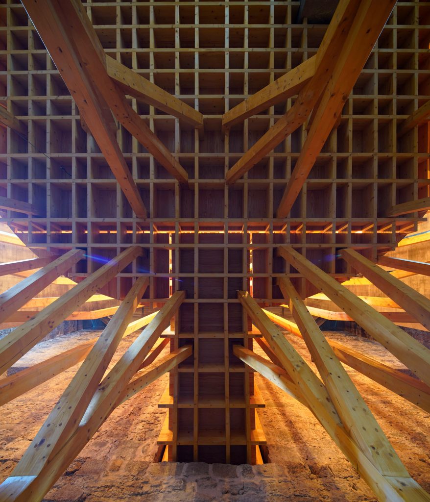 Portuguese architects Cerejeira Fontes renovate the Imaculada Chapel with an “indoor forest” structure
