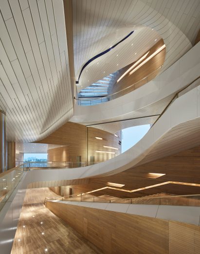 UNStudio reveals new riverside marina and clubhouse inspired by the shape of luxury yachts