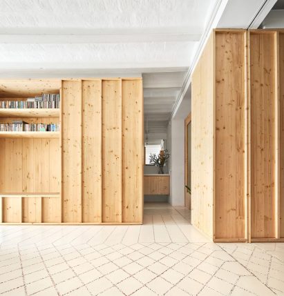 Original tiles are crushed to create a new floor in this Barcelona apartment