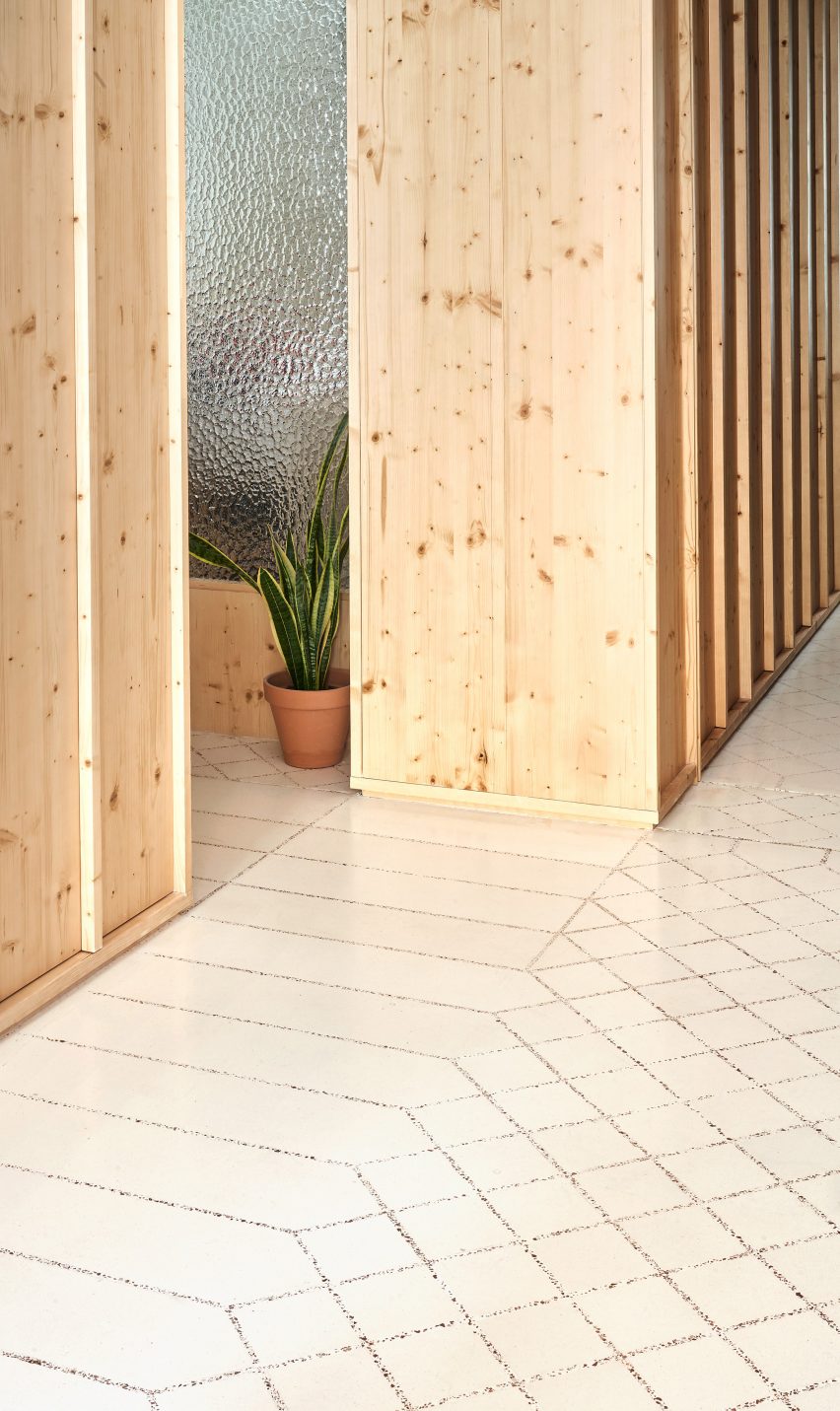 Original tiles are crushed to create a new floor in this Barcelona apartment