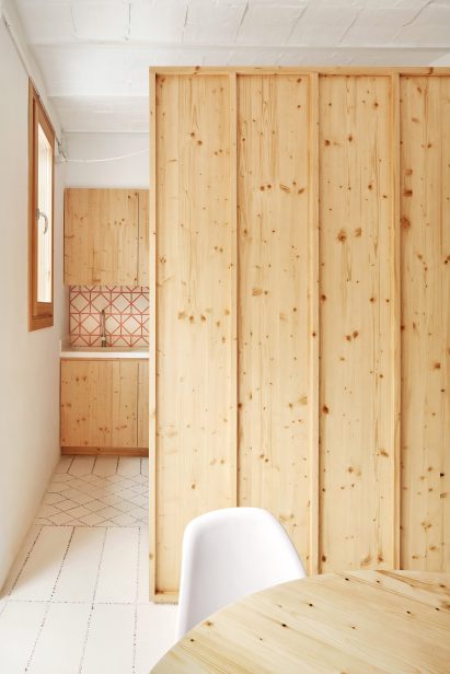 Original tiles are crushed to create a new floor in this Barcelona apartment