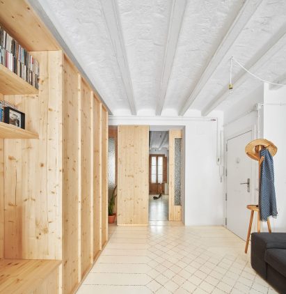 Original tiles are crushed to create a new floor in this Barcelona apartment