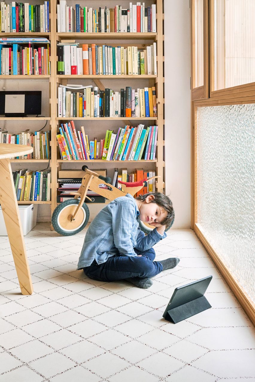 Original tiles are crushed to create a new floor in this Barcelona apartment