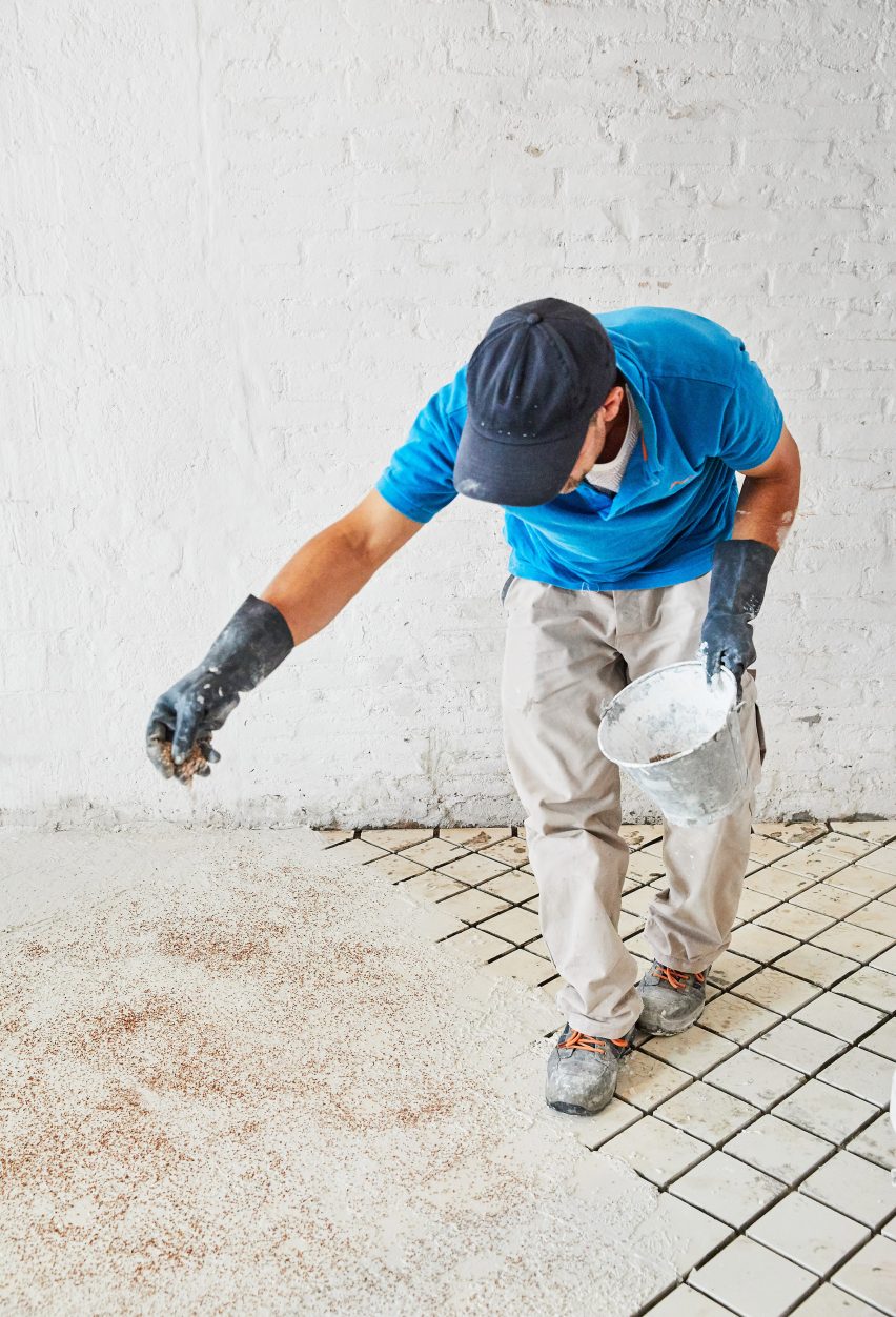 Original tiles are crushed to create a new floor in this Barcelona apartment