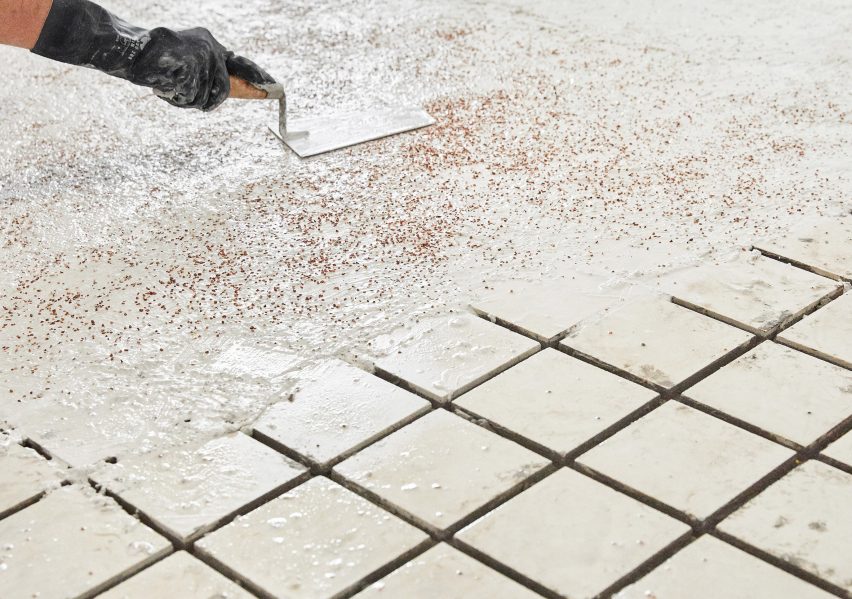 Original tiles are crushed to create a new floor in this Barcelona apartment