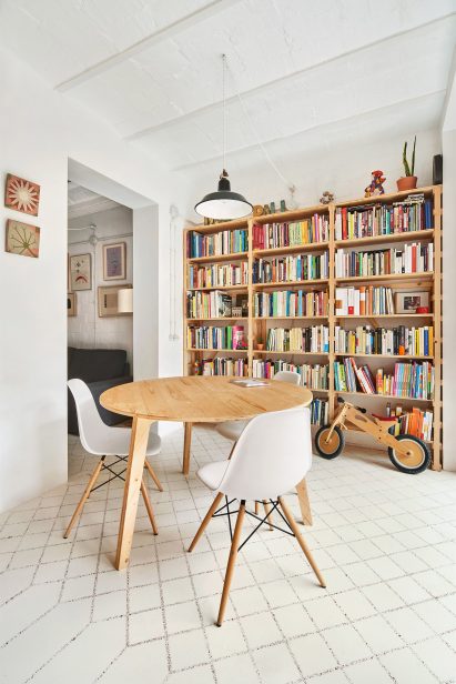 Original tiles are crushed to create a new floor in this Barcelona apartment