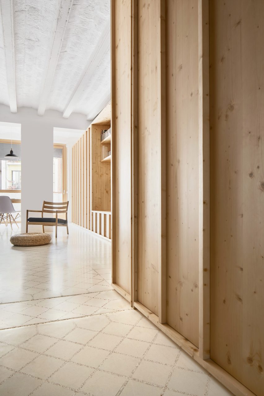 Original tiles are crushed to create a new floor in this Barcelona apartment